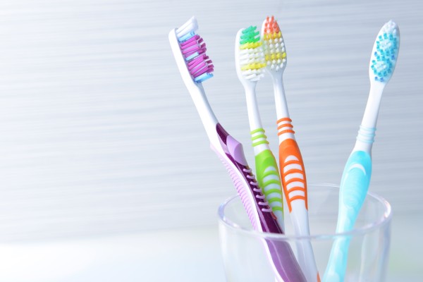 Ask A Dentist: Are Electric Toothbrushes Really Better For Your Teeth?